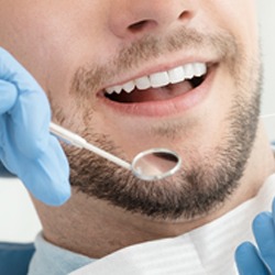  Man getting a dental cleaning 