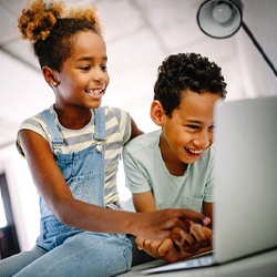 children playing on a computer together